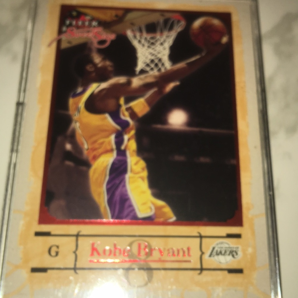 Kobe collectors card #8 card on plaque by Fleer.